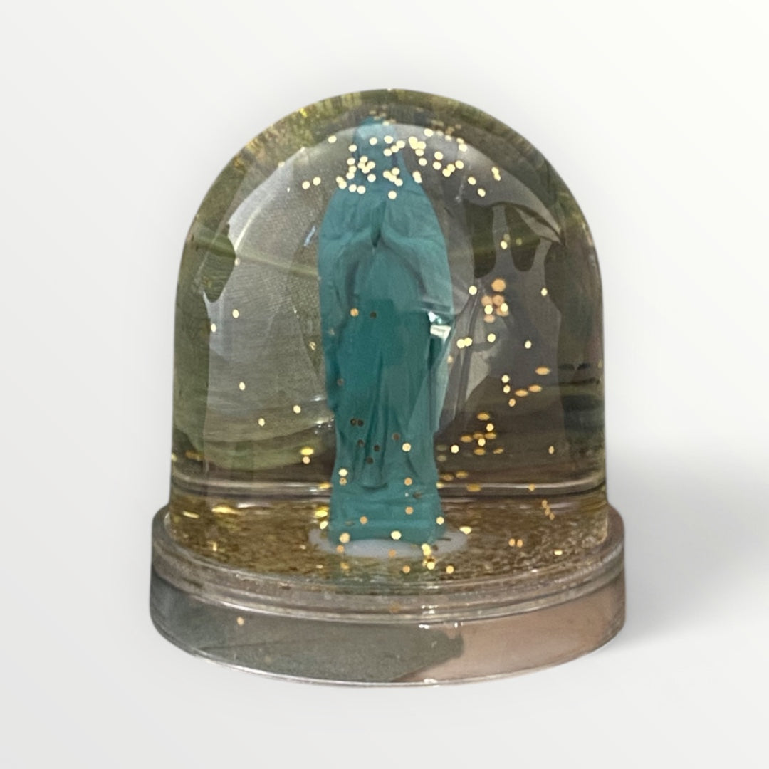 Virgin Mary snow globe